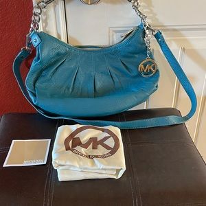 New MK purse. With cover bag. Unique blue texture.